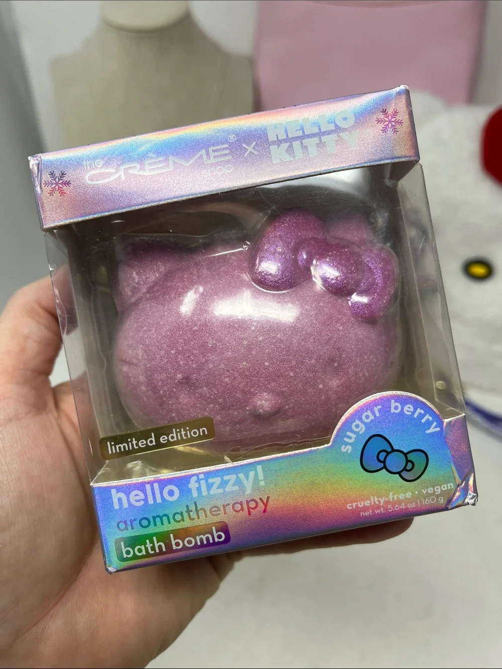 HELLO KITTY BUNDLE 7 -BEANIE, 2 KEYCHAIN, CRÈME SHOP BATH BOMB LIP BALM, CHARM